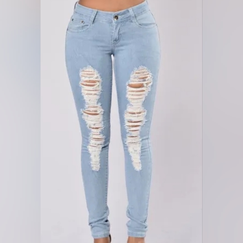 Hi rise, Light blue wash, Distressed skinnies, Size S. NO stains Excellent condi